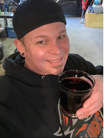 Adam Moore, owner and tattoo artist at Twizted Ink